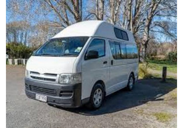 Perfect for a couple or small family, the Happy 3 berth camper is a convenient, economical drive.
It includes everything you need for sleeping in comfort and cooking a meal, without compromising the care-free Happy Campers way of life. With a double bed, large single bed located in the roof and seating for three in the front cab, this vehicle is the perfect partner for your New Zealand travels.
This vehicle comes complete with a fridge, two-burner gas-cooker, cold running water, ample cupboard and shelf space plus complete kitchen equipment, to let you take control of your own adventure.